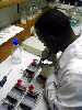 AMU biotechnology student loading DNA onto a gel